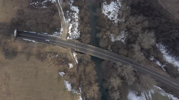 Traffic over the bridge by the day 4K aerial footage