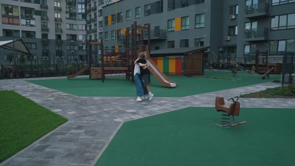 Meeting Mother with Child on the Playground alt