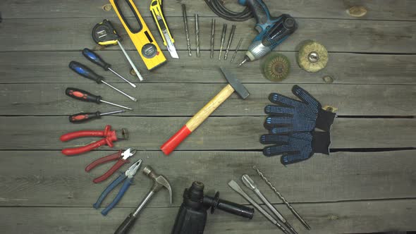 Variety of Electro and hand Tools and live Gloves.