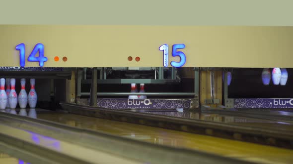 Empty of lead machine bowling pinsetter and lane sport community center activity alt