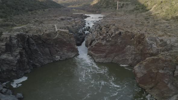 Pulo do Lobo waterfall drone aerial view in Alentejo, Portugal alt