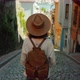 A young girl in a hat standing on a Turkish street in Istanbul - VideoHive Item for Sale