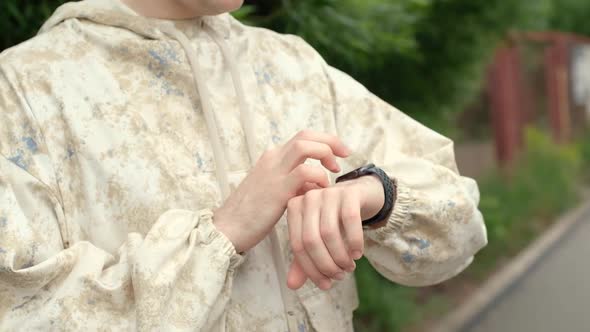 Smart Watch on a Man's Hand alt