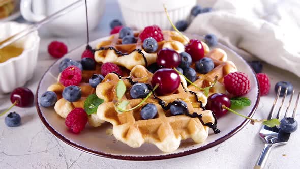 Sweet belgian waffles with berry