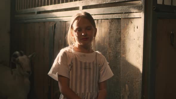 Little Girl in Goat Stall alt