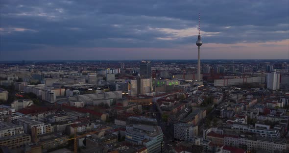 AERIAL: Day To Night Hyperlapse, Motion Time Lapse of Berlin with Alexanderplatz TV Tower City View alt