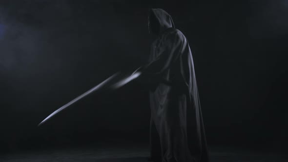 Horrible Dark Figure In A Hoodie With A Scythe alt