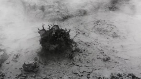 Volcanic Activity On Kamchatka Peninsula - view of Boiling Thermal Mud Pot in Crater Active Volcano