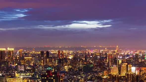 day to night time lapse of city view in Taipei, Taiwan