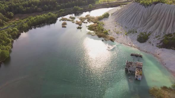 Sand Hills of Quarry With a Pond and Abandoned Prison in Rummu Estonia Europe. Aerial Dron Shoot. alt