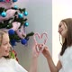Two Teen Girls Having Fun Near the Christmas Tree - VideoHive Item for Sale
