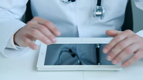 Doctor Using Digital Tablet Computer