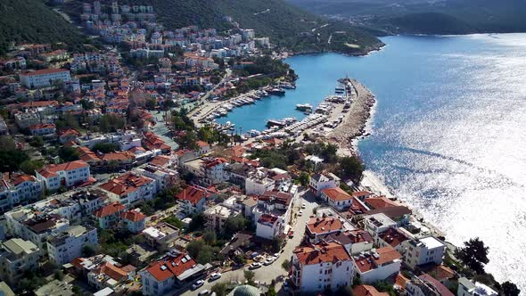 The top view from the drone of Kas resorts, bay, yahts, city in Mugla in Turkey alt