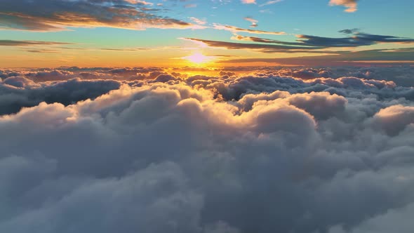 Camera Rises Above Clouds Golden Sunrise alt