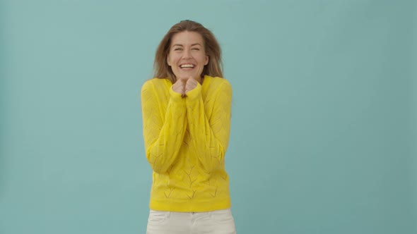 Woman in Yellow Blouse Laughing