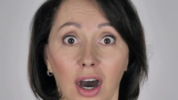 Close Up of Shocked Wondering Businesswoman Face alt