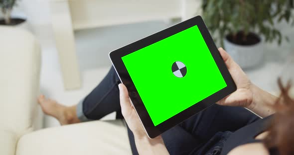 Woman Holding Tablet Chromakey Indoors