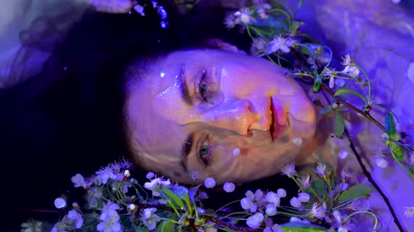 Charming Beauty Woman is Lying in Water Mysterious and Fabulous Portarit of Lake Nymph alt