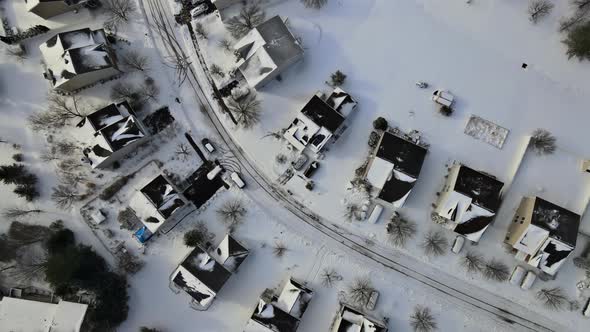 High Altitude View of City with Snow Covered Roofs Houses Neighborhood Town Residential alt
