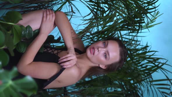 Woman in Plants is Shot for Advertising Swimwear Cosmetics for Face Care