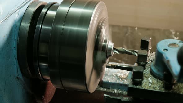 Turner Is Working on a Turning Lathe at the Metal Constructions Factory. Heavy Industry alt