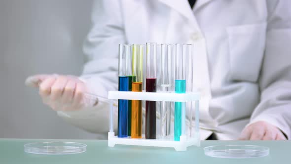 Scientist Working on the Development of the Antiviral Vaccine alt