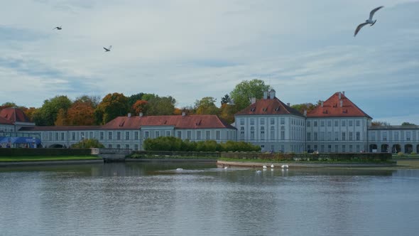 Nymphenburg Palace in Munich During October. Famous Tourist Landmark in Minchen, Lake with Beautiful alt