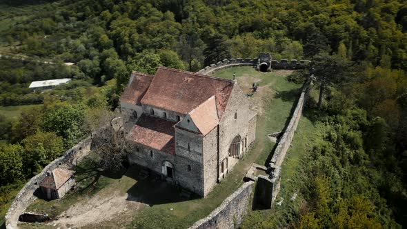 Aerial view from drone flying around a fortified church in Romania