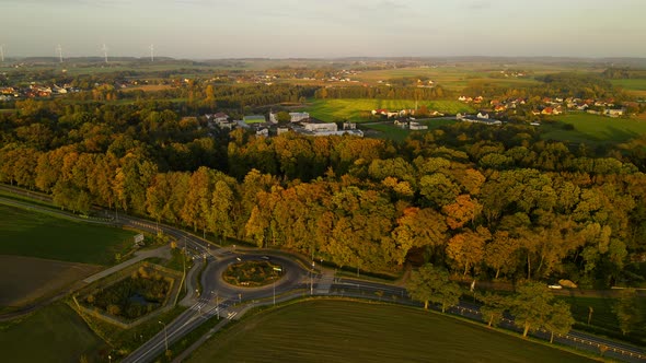 Aerial View Of Roundabout In Town Of Lubawa, Poland During Autumn - drone shot alt
