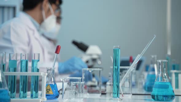 doctor scientist has researching a vaccine in the laboratory, meeting and writing analysis results alt