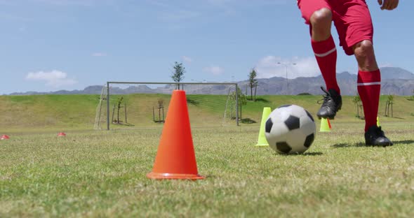 Soccer players training on field alt