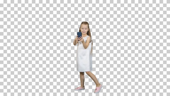 Happy little girl take a selfie with a smart phone, Alpha Channel