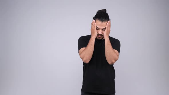 Depressed Indian man struggling to think alt