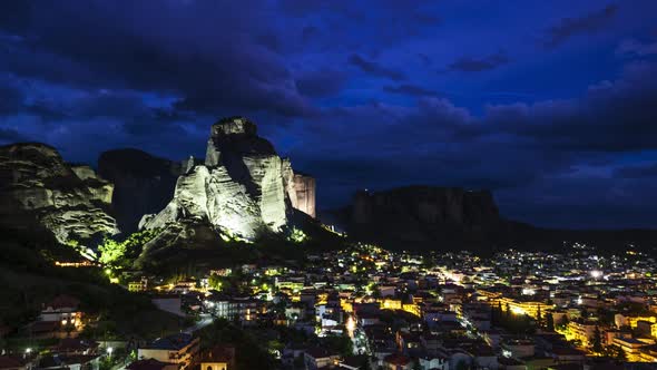 Timelapse view of Meteora rock and Kalambaka village in Meteora, Greece at night