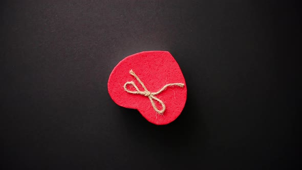 Heart Shaped Valentines Day Gift Box on Black Bacground. alt