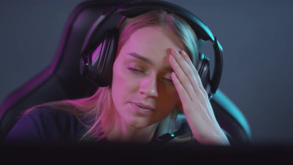 Female Gamer Losing Round Portrait alt