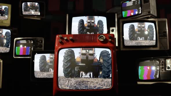 Tractor on Rural Field and Pile of Retro TV.