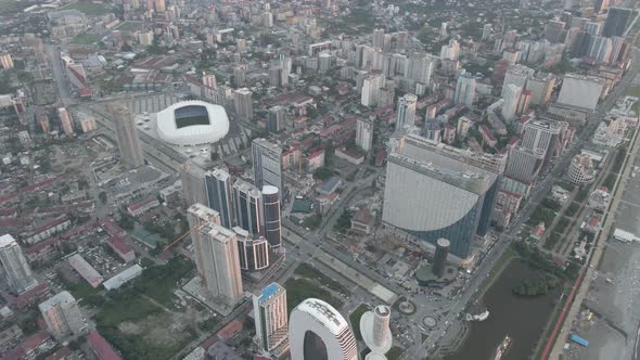 Aerial shot of Dinamo Batumi Stadium near Heroes Square against cityscape alt