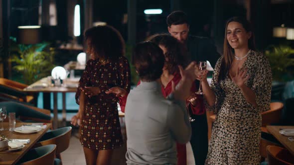 Drinking Friends Partying Together on Luxury Birthday Celebration at Restaurant alt