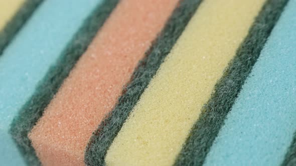 Various colors of  dish washing  sponges 4K panning footage