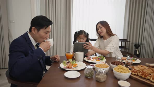  family husband wife and children girl happy smile talking playing to each other