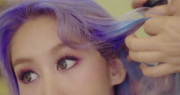 Close up Beautiful Asian Woman With Magnificent Galaxy Hair Style By Hairdresser. alt