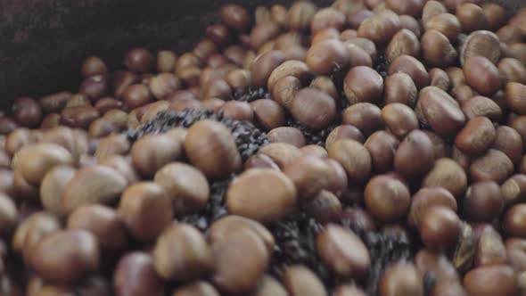 Roasted Chestnuts in the Market. Phnom Penh, Cambodia, Asia alt
