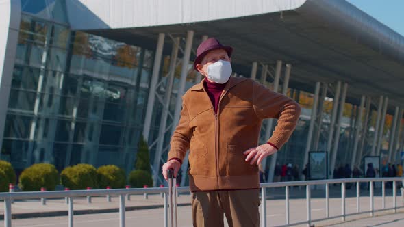 Senior Pensioner Tourist Grandfather Wearing Protective Face Mask Avoid Coronavirus Near Airport alt