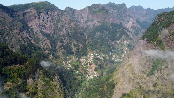 Drone view of a mountain village in Madeira Island, Portugal. Rural holidays. Travel the world.