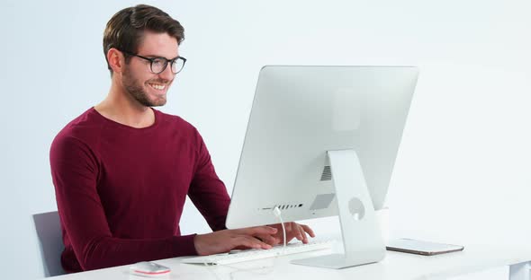 Male executive working on personal computer 4k alt