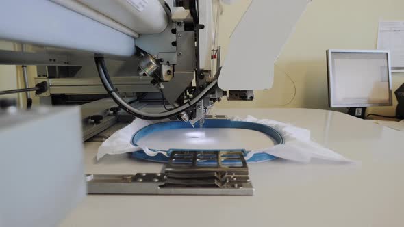 Operation of an Industrial Robotic Sewing Machine.