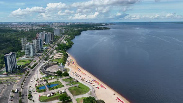 Famous Ponta Negra Beach at downtown Manaus Amazonas Brazil. alt