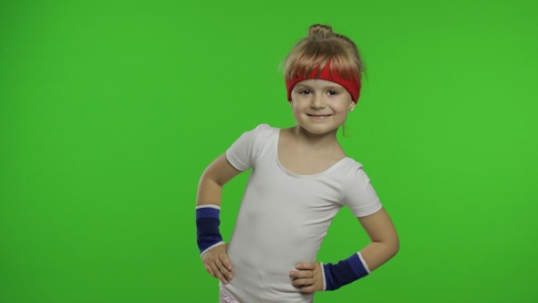 Little Cute Girl in Sportswear Making Fitness Gymnast Home Exercises. Workout for Kids. Sporty Child alt