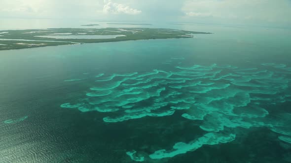 Drone Shot of Lighthouse Reef Giant Marine Atoll in Caribbean Sea in Belize Caye